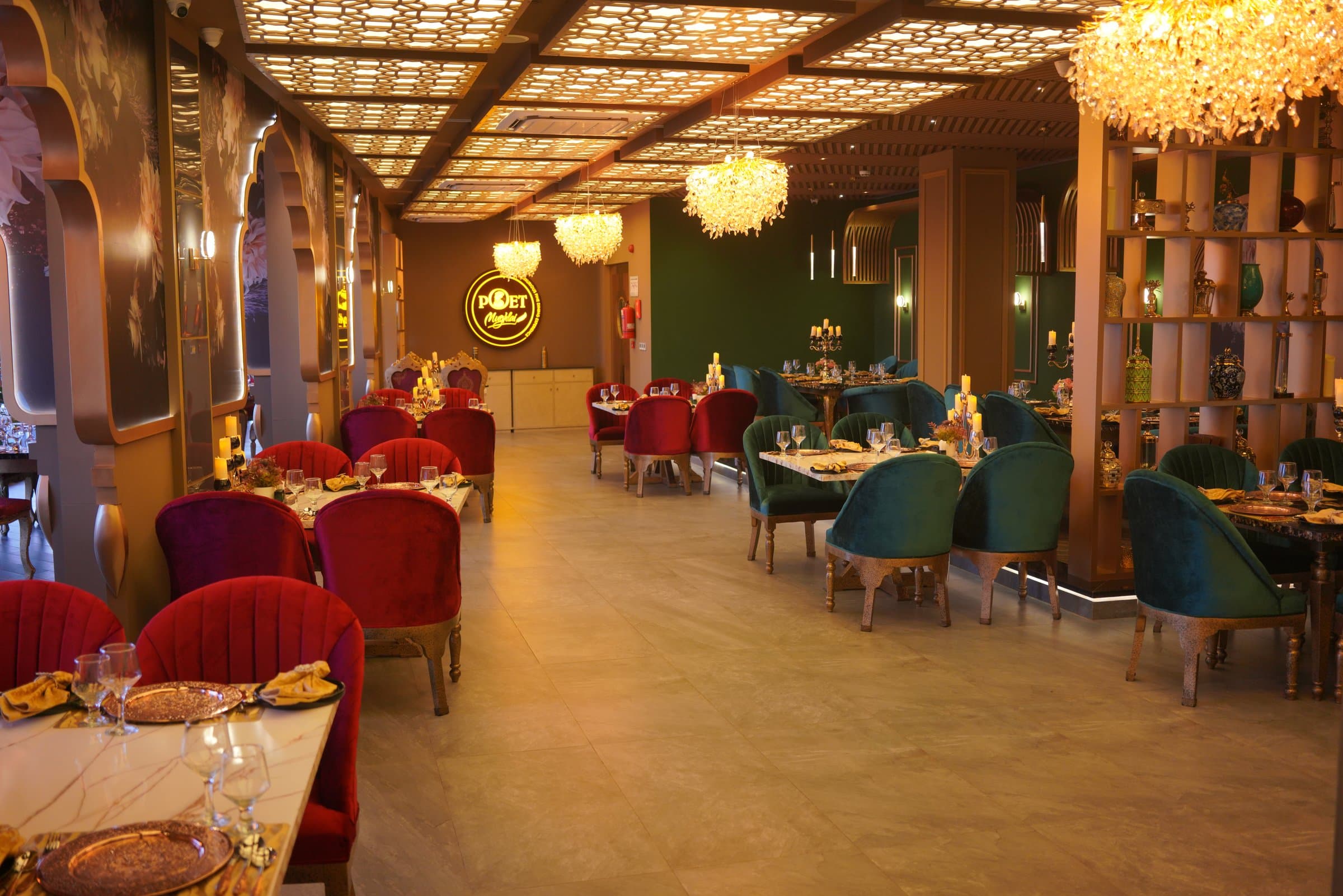 Crystal Chandeliers, Hand-crafted crystal chandeliers cast a warm, candlelit glow across the dining room every evening.