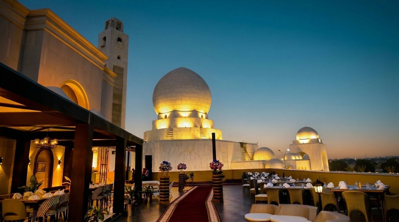 Poet Rooftop Garden at golden hour with bistro lights overhead, Lahore skyline visible at dusk